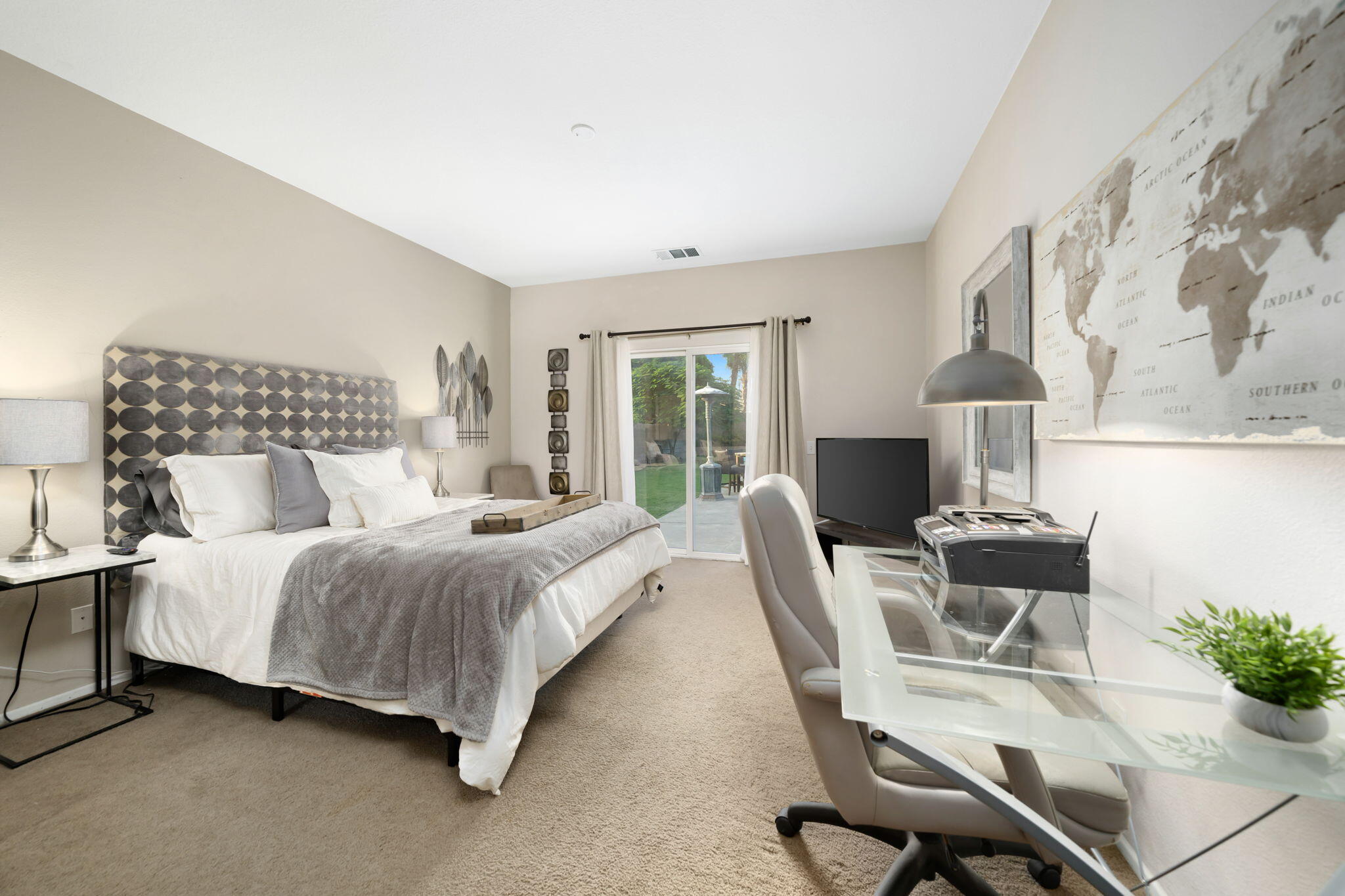 83258 Brighton Crest Drive Indio, CA 92203 - Photo 44 of 69 a bedroom with a bed chair and window