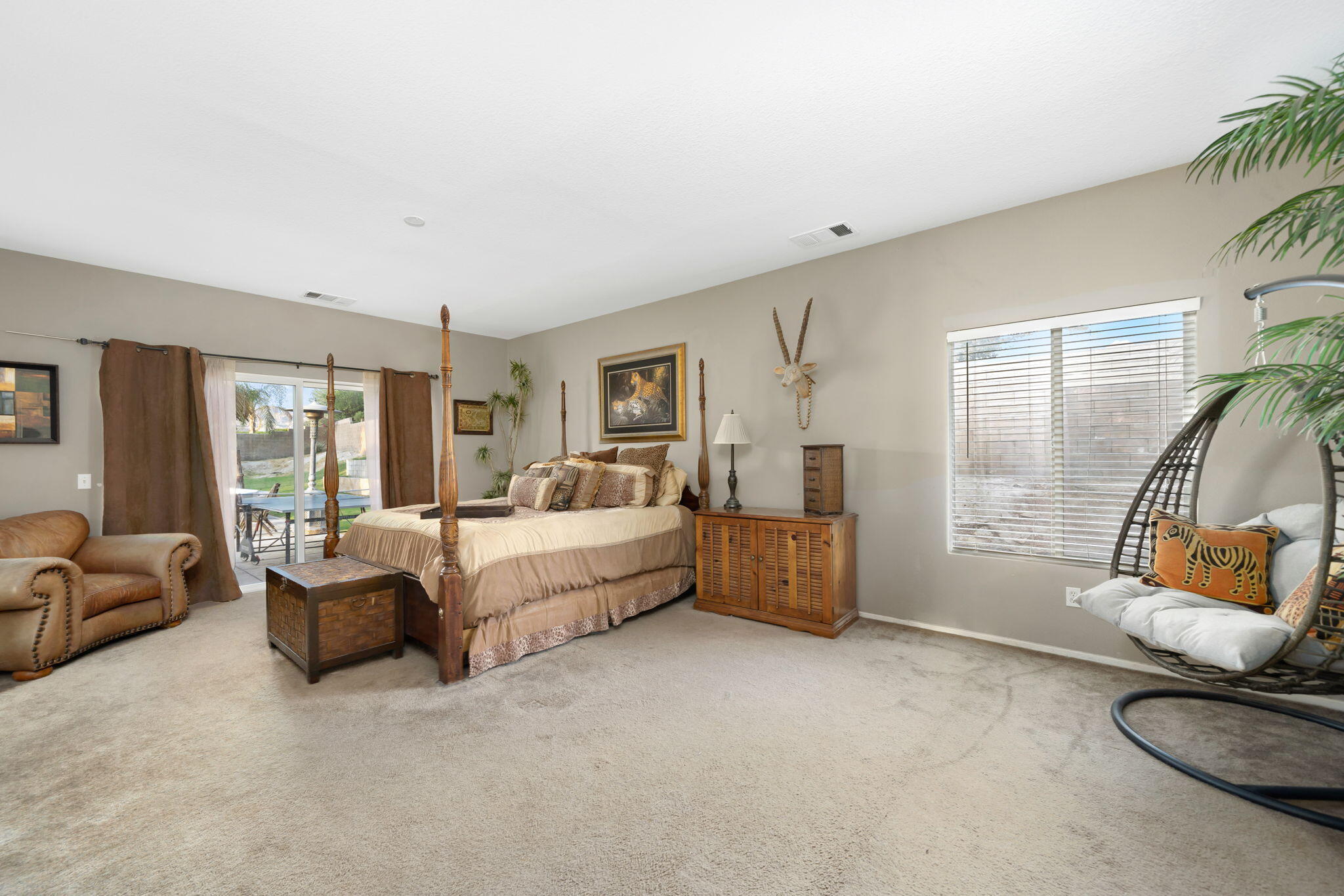 83258 Brighton Crest Drive Indio, CA 92203 - Photo 48 of 69 a bed room with furniture and a window