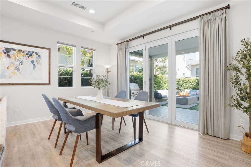 22 Jarano Street Rancho Mission Viejo, CA 92694 - Photo 13 of 75 a dining room with furniture and wooden floor