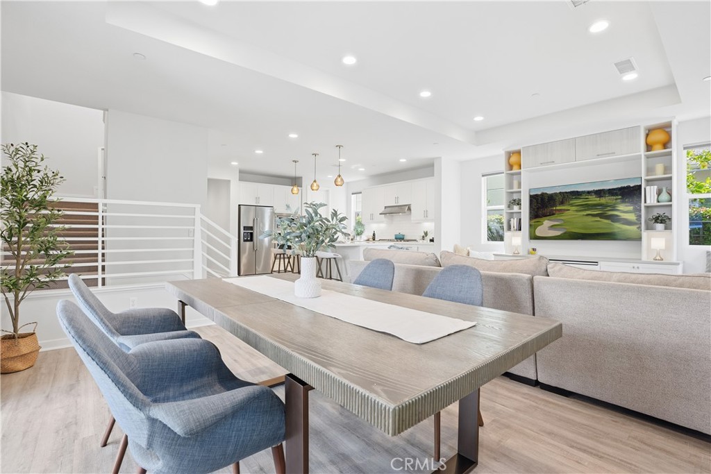 22 Jarano Street Rancho Mission Viejo, CA 92694 - Photo 15 of 75 a view of a dining room with furniture and wooden floor