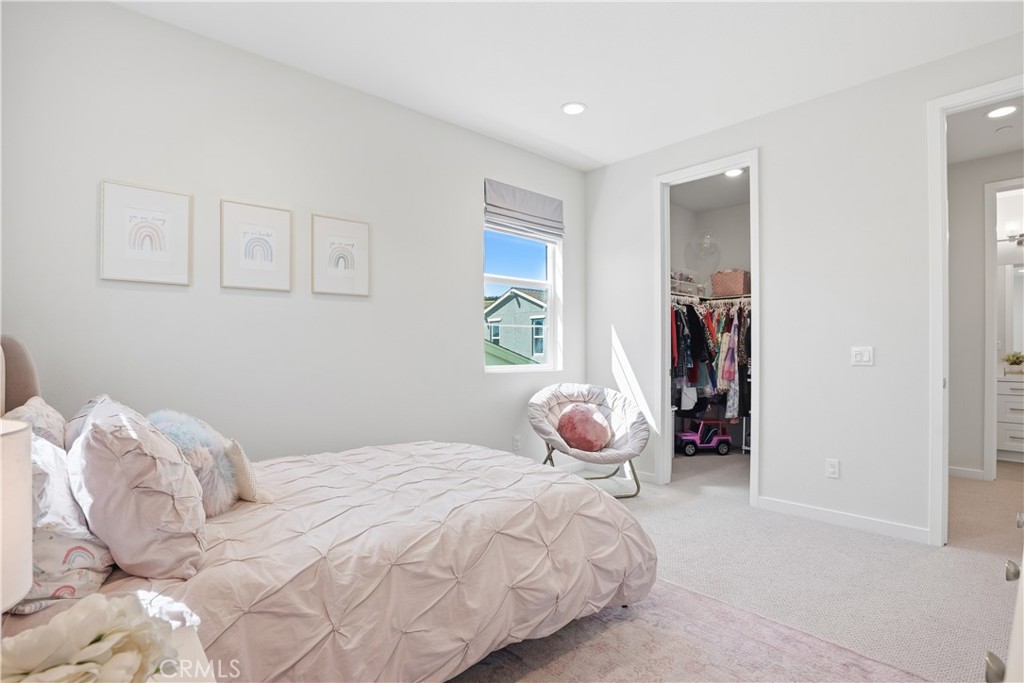 22 Jarano Street Rancho Mission Viejo, CA 92694 - Photo 31 of 75 a bedroom with a bed and a window