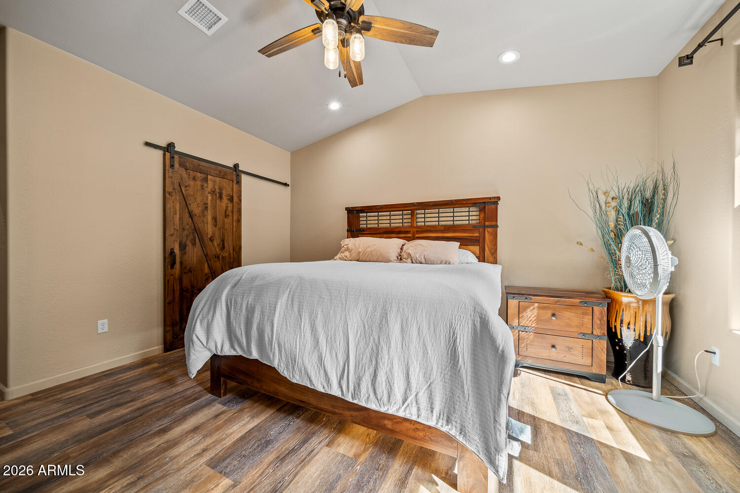 3160 North Eagle Landing Road Show Low, AZ 85901 - Photo 22 of 37 a bedroom with a bed and a chandelier