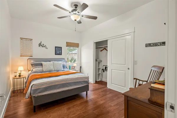 a room with a bed and furniture