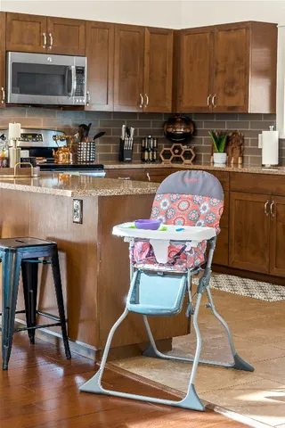 a kitchen with a sink and a stove