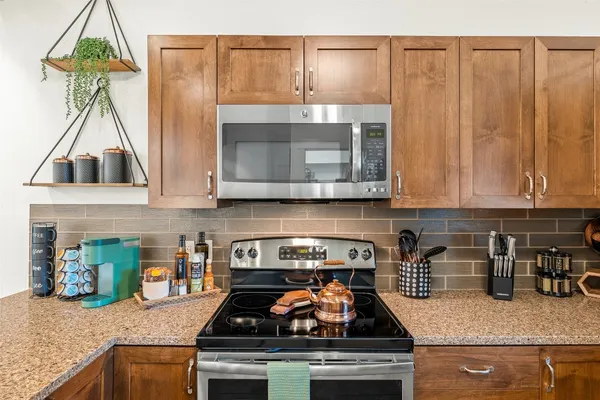 a bathroom with a sink a vanity and a mirror