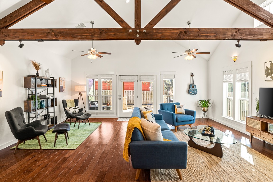 435 Hays Street Dripping Springs, TX 78620 - Photo 6 of 36 a living room with furniture and a wooden floor