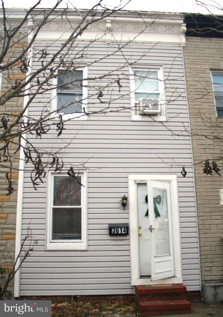 3614 2nd Street Baltimore, MD 21225 - Photo 3 of 4 a view of a house with a door and wooden floor