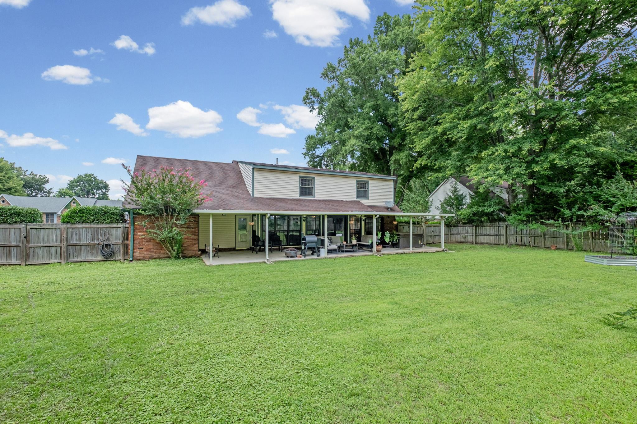 4729 Cedar Ridge Drive Millington, TN 38053 - Photo 37 of 40 Expansive green lawn with a full wooden fence