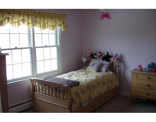 4 Andrea Terrace Shirley, MA 01464 - Photo 14 of 19 a bedroom with a bed and a window