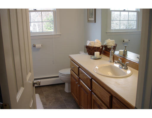 4 Andrea Terrace Shirley, MA 01464 - Photo 15 of 19 a bathroom with a sink a toilet and a window