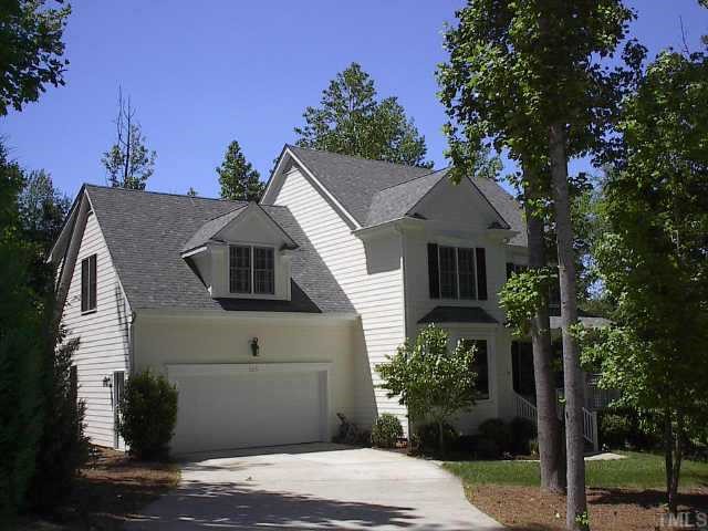 505 Manor Ridge Road Carrboro, NC 27510 - Photo 1 of 1 a front view of a house with garden