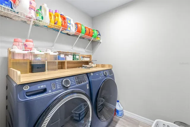 a utility room with dryer and washer