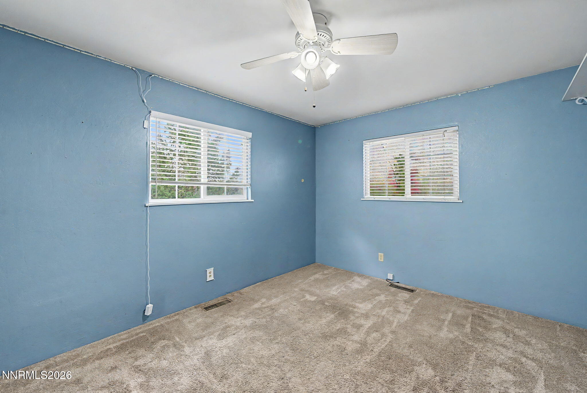 11577 Deodar Way Reno, NV 89506 - Photo 26 of 58 a view of an empty room with a window