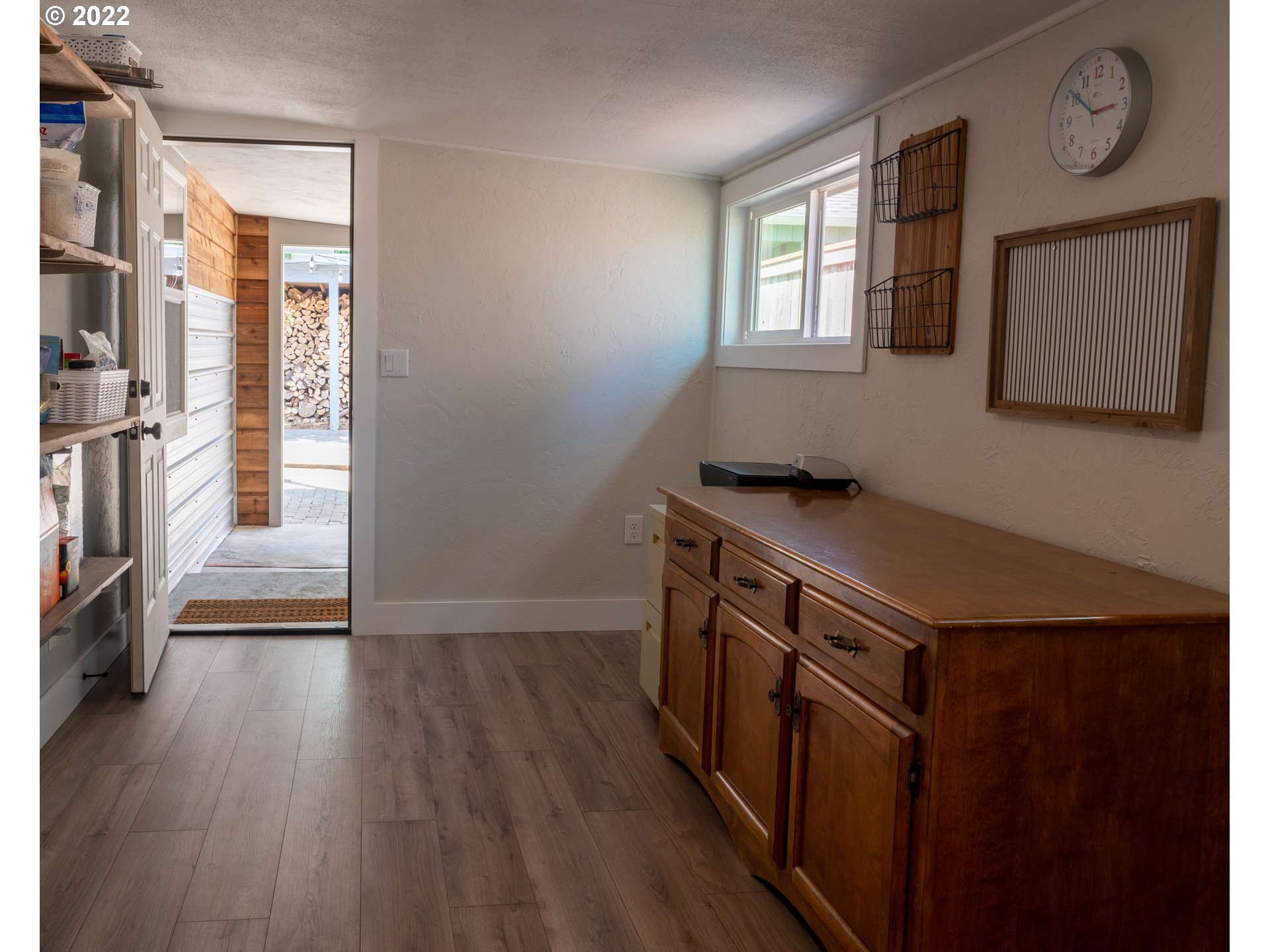 36227 Enterprise Road Creswell, OR 97426 - Photo 26 of 32 a utility room with wooden floor and a window