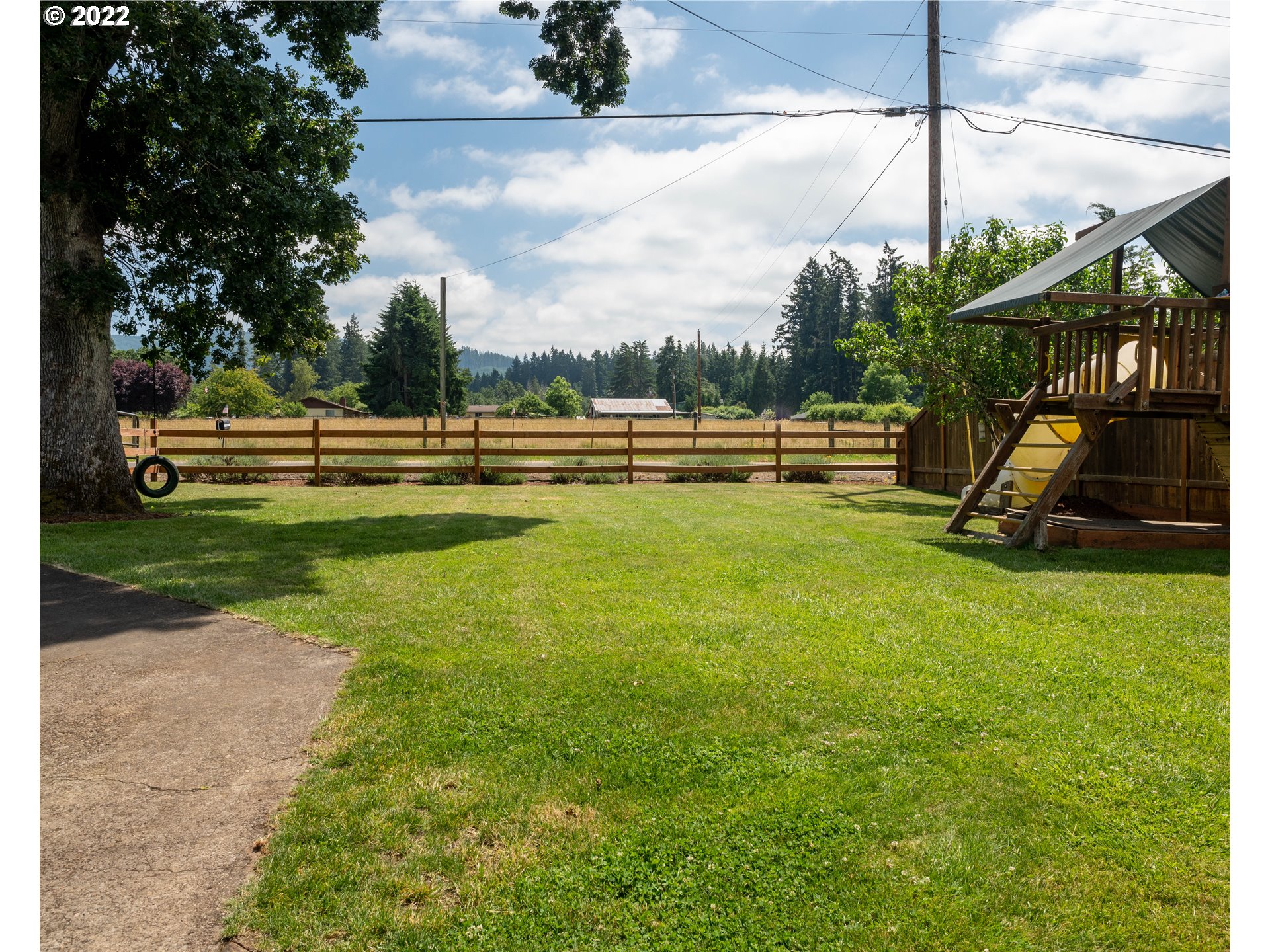 36227 Enterprise Road Creswell, OR 97426 - Photo 30 of 32 a view of a swimming pool with a patio