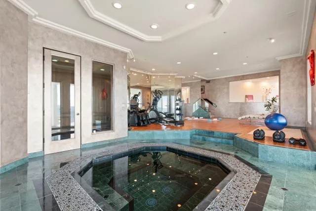 a kitchen with a table and chairs