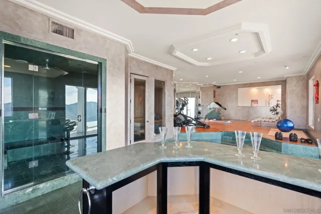 a kitchen with a sink and counter top space