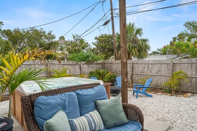 a view of house with outdoor seating