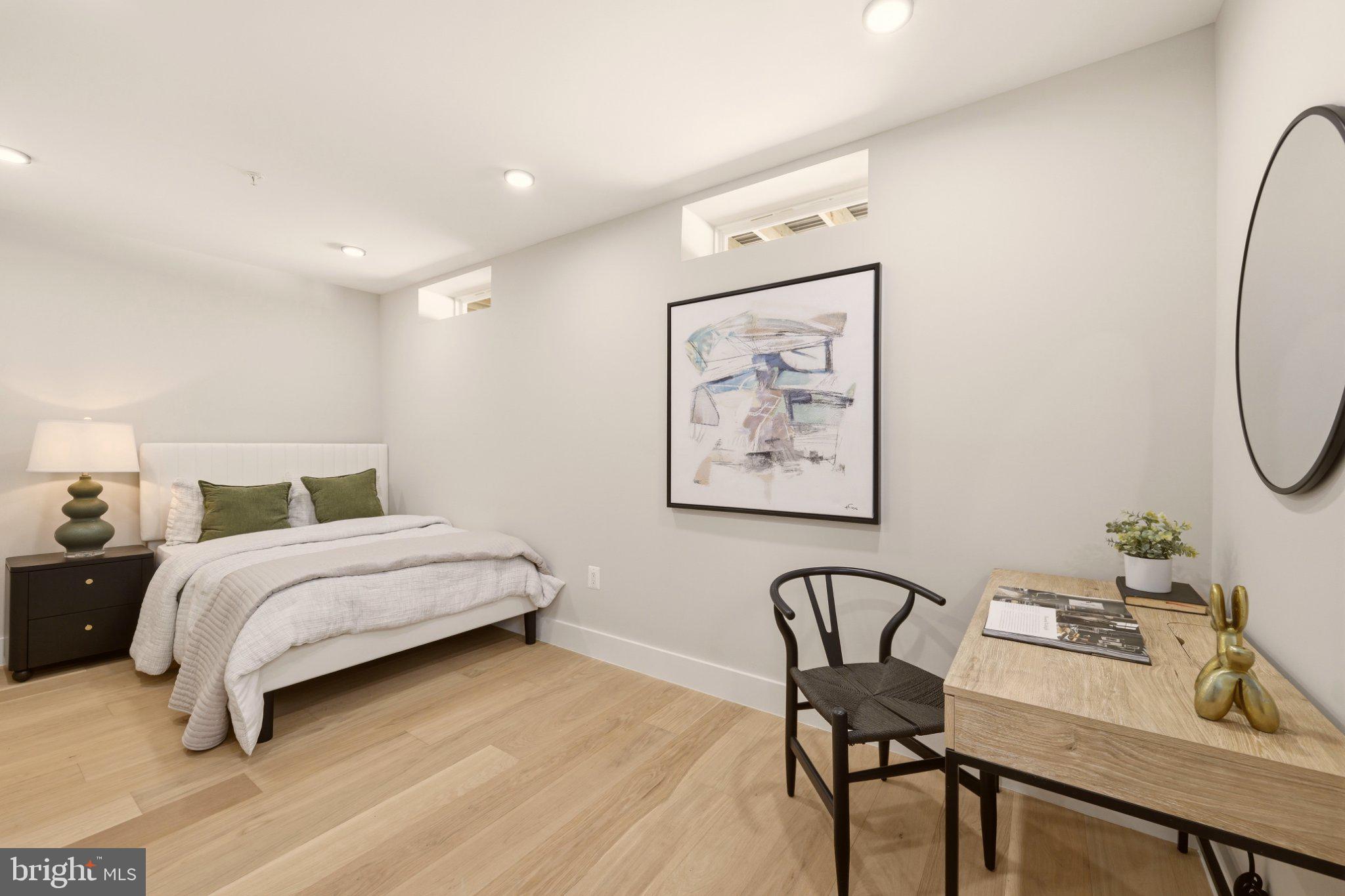 724 Rock Creek Church Road Northwest, Unit B Washington, DC 20010 - Photo 7 of 18 Serene bedroom with modern accents.