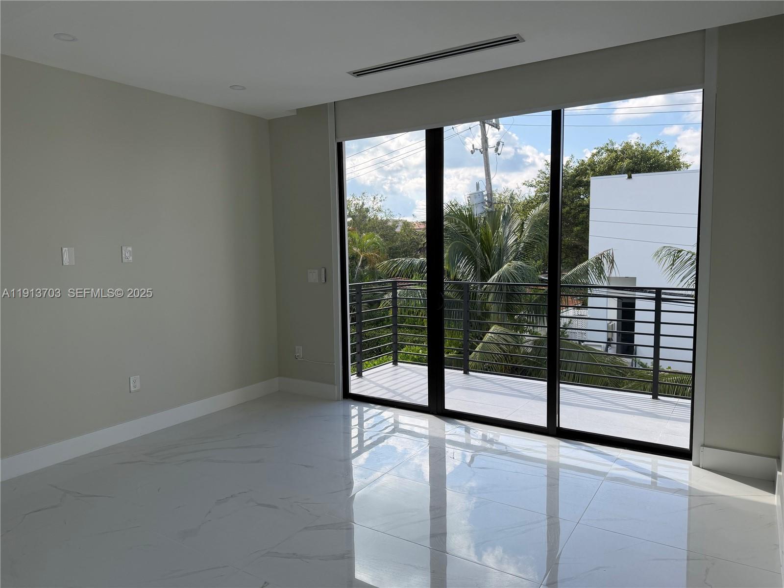 570 Fernwood Road Key Biscayne, FL 33149 - Photo 11 of 18 a view of a room with window
