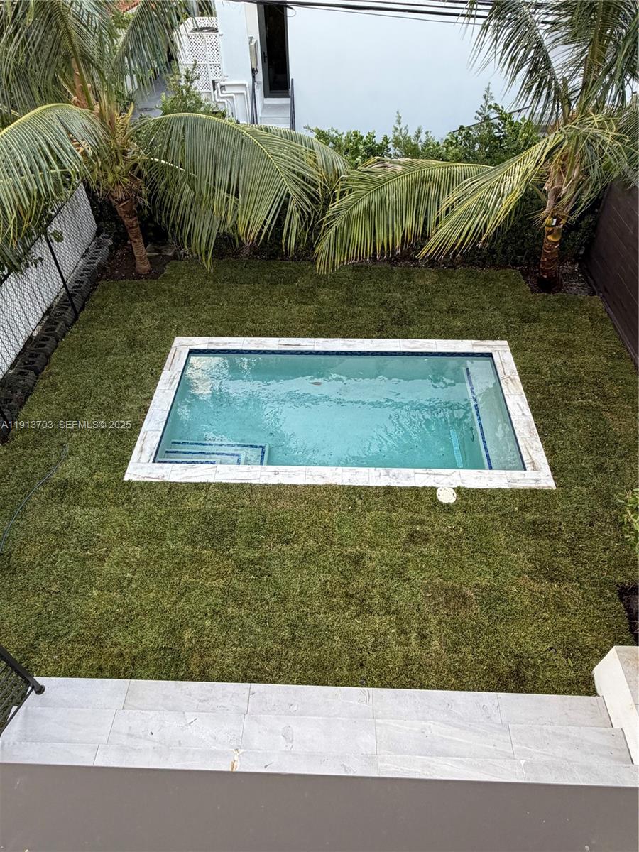 570 Fernwood Road Key Biscayne, FL 33149 - Photo 18 of 18 a view of swimming pool