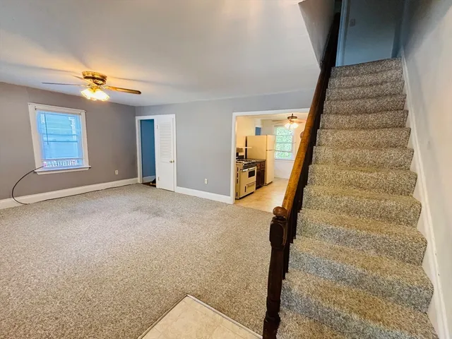 a view of an entryway with staircase