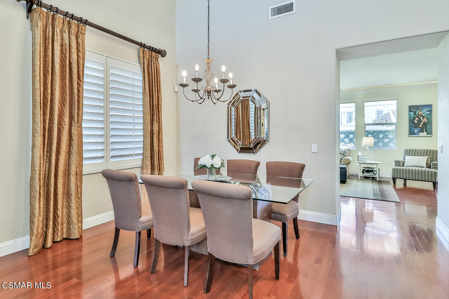 4904 Promenade Street Simi Valley, CA 93063 - Photo 11 of 63 a view of a dining room with furniture window and wooden floor
