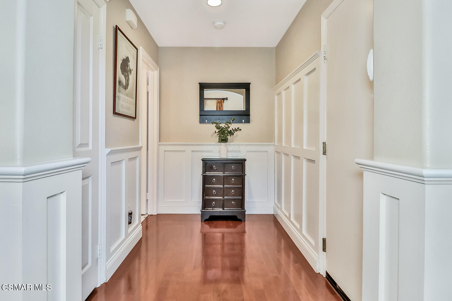 4904 Promenade Street Simi Valley, CA 93063 - Photo 13 of 63 a view of a hallway with wooden floor and staircase