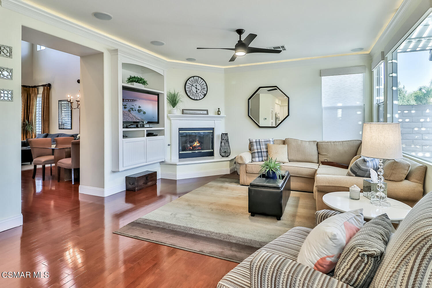 4904 Promenade Street Simi Valley, CA 93063 - Photo 17 of 63 a living room with furniture and a fireplace