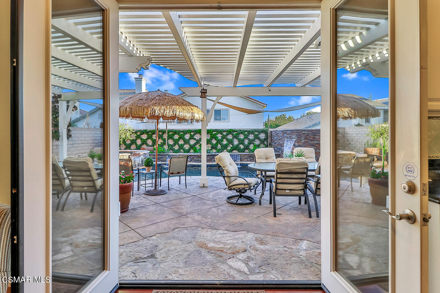 4904 Promenade Street Simi Valley, CA 93063 - Photo 20 of 63 a view of a tables and chairs in patio