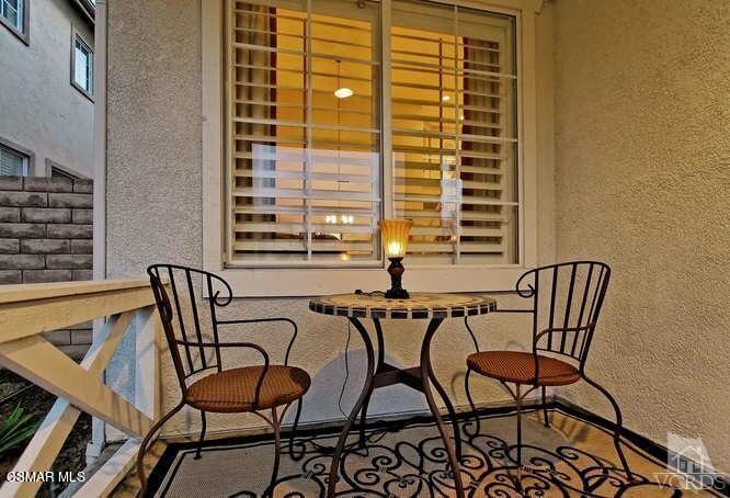 4904 Promenade Street Simi Valley, CA 93063 - Photo 2 of 63 a view of a chairs and table in the balcony