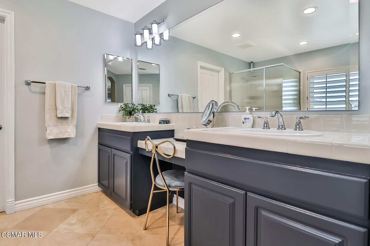 4904 Promenade Street Simi Valley, CA 93063 - Photo 36 of 63 a bathroom with a sink double vanity and a mirror