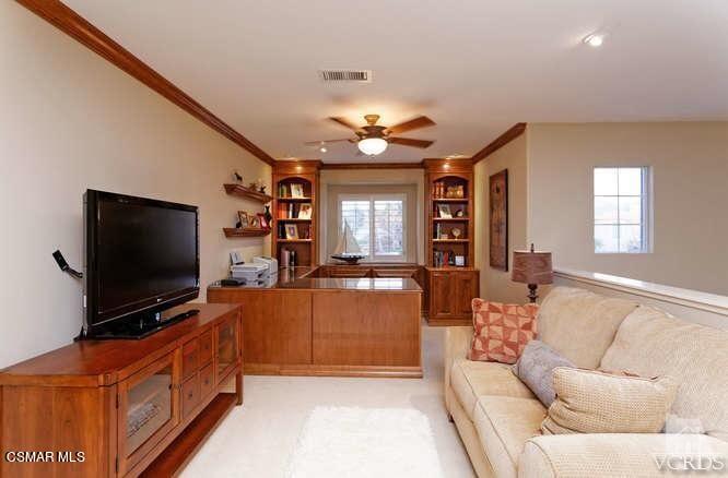 4904 Promenade Street Simi Valley, CA 93063 - Photo 50 of 63 a living room with furniture and a flat screen tv