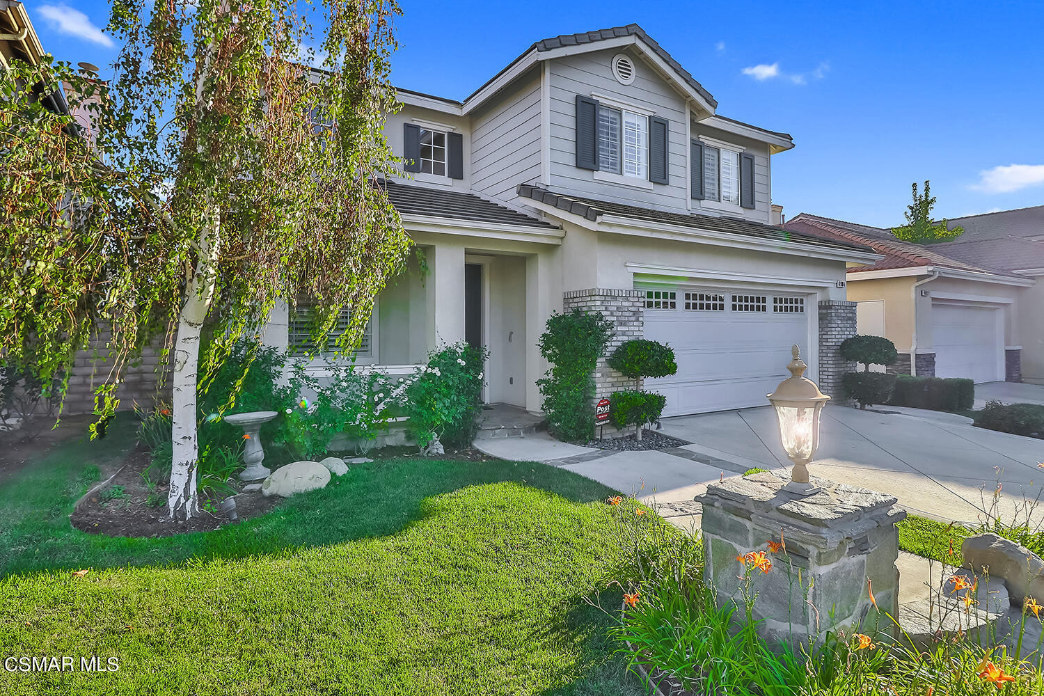 4904 Promenade Street Simi Valley, CA 93063 - Photo 5 of 63 a front view of a house with garden