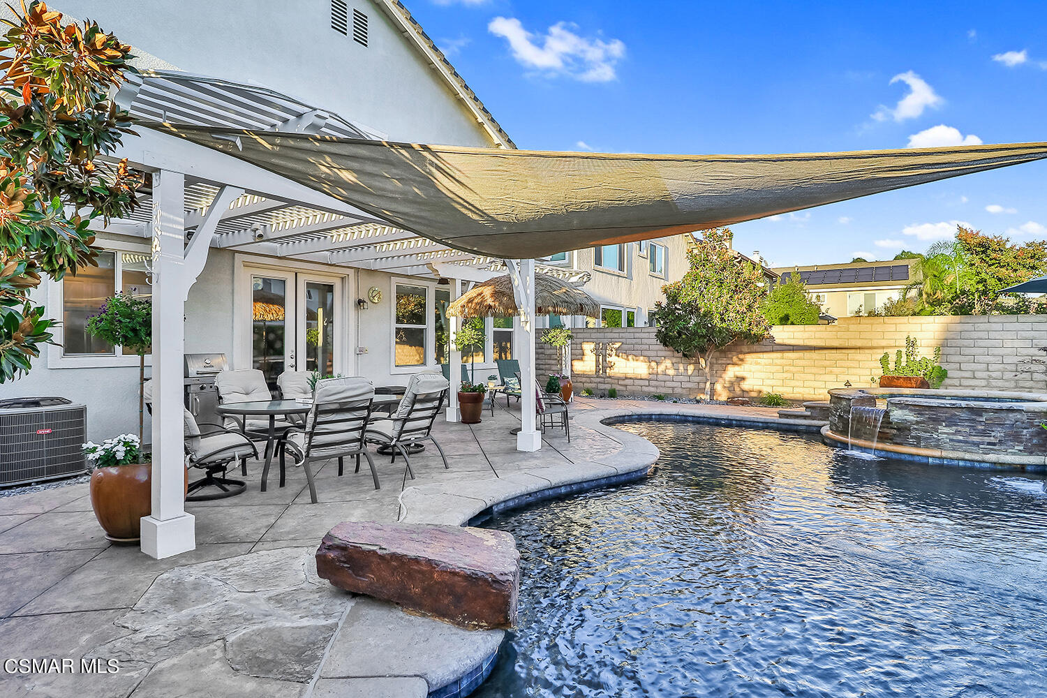 4904 Promenade Street Simi Valley, CA 93063 - Photo 61 of 63 a view of a patio with dining table and chairs with plants