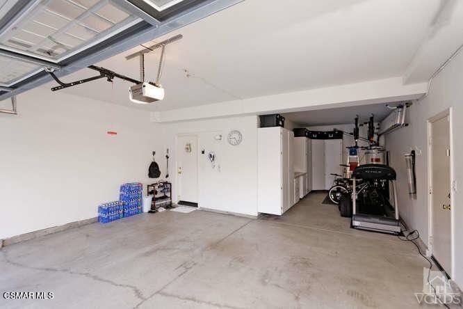 4904 Promenade Street Simi Valley, CA 93063 - Photo 62 of 63 a view of a garage with furniture