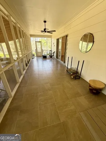a view of an outdoor space with furniture