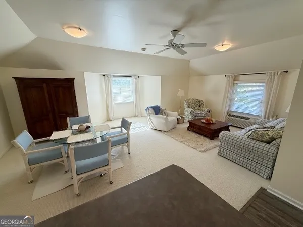 a kitchen with stainless steel appliances granite countertop a stove and a refrigerator