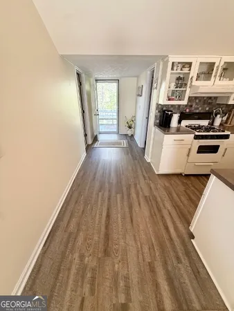 a bedroom with a bed and a ceiling fan
