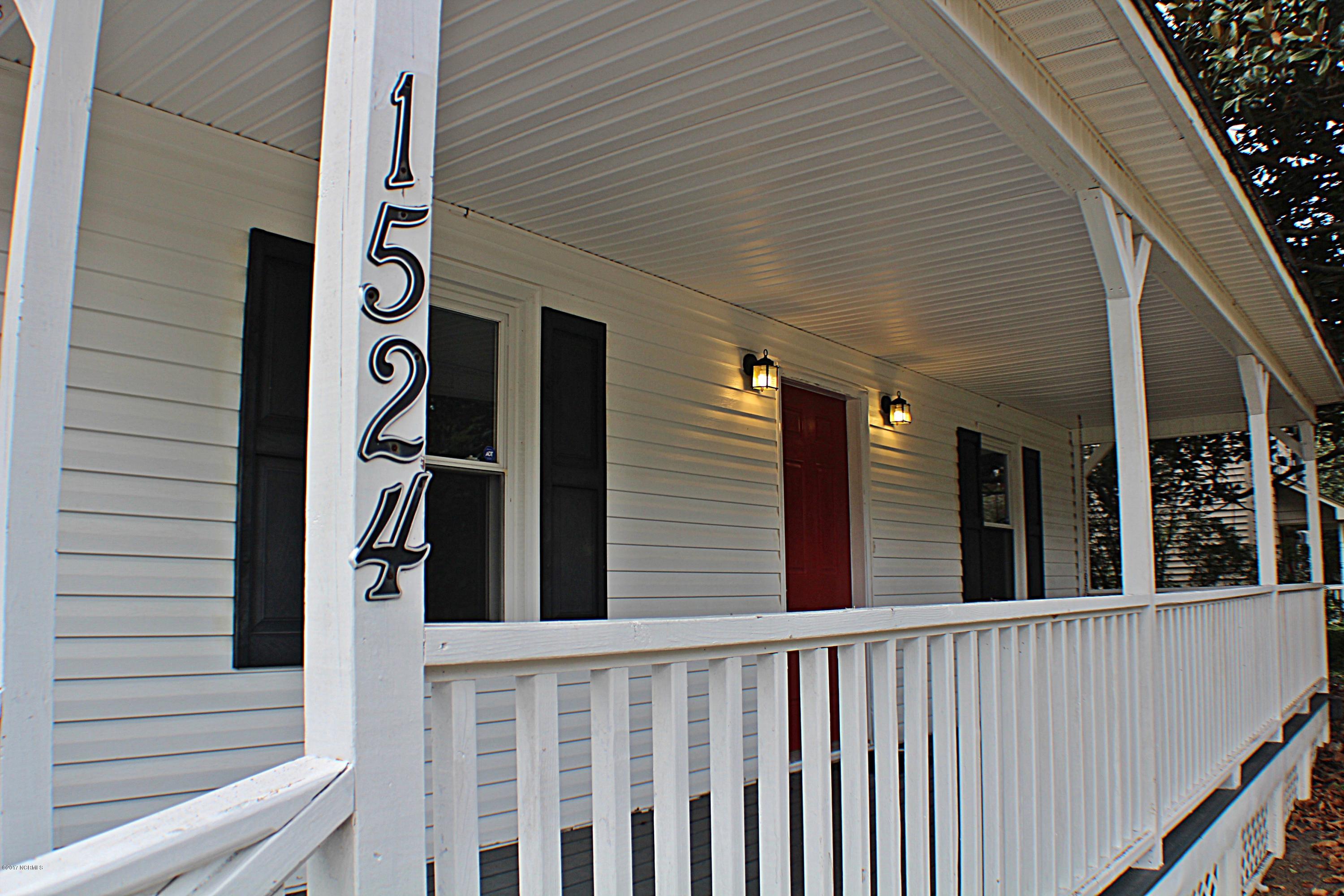 1524 Middle Sound Loop Road Wilmington, NC 28411 - Photo 5 of 30 Rocking chair front porch