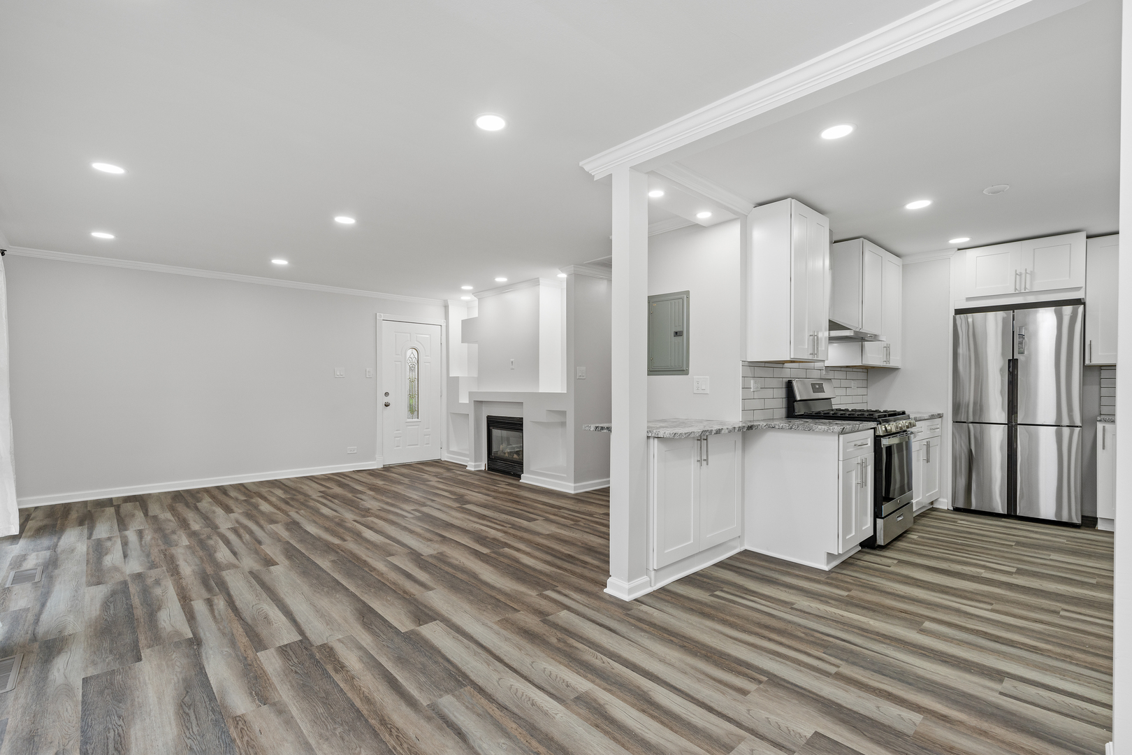 388 Nancy Lane Wheeling, IL 60090 - Photo 6 of 22 a view of kitchen view wooden cabinets and stainless steel appliances