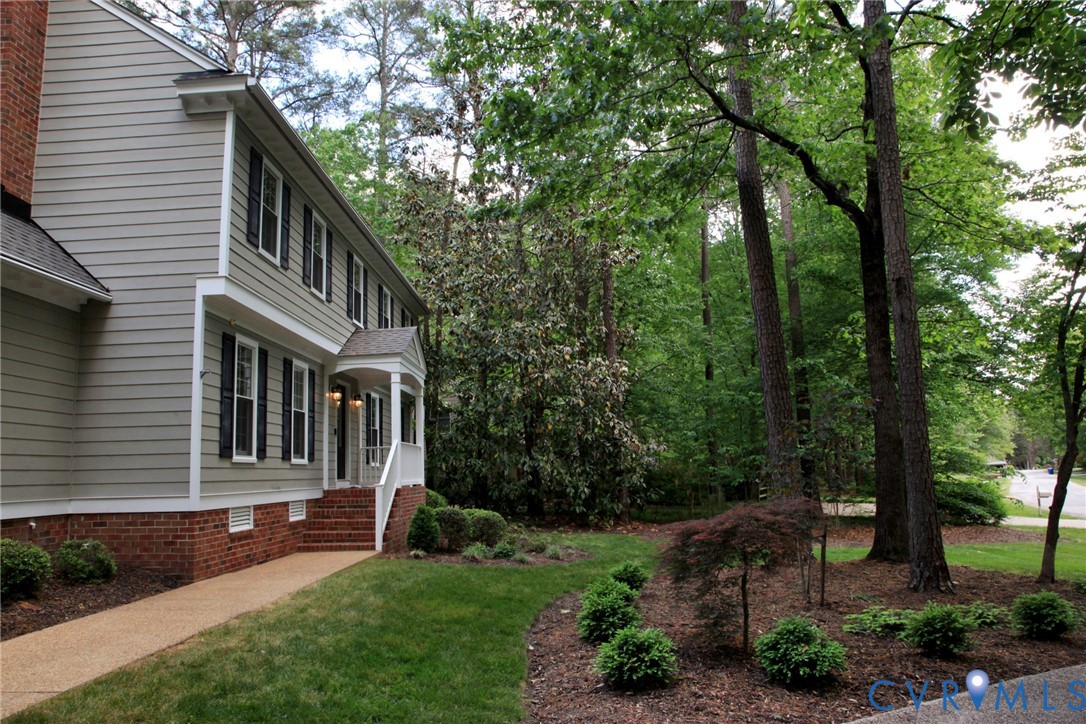 231 Hazelmere Drive Chesterfield, VA 23236 - Photo 2 of 33 a front view of a house with a yard