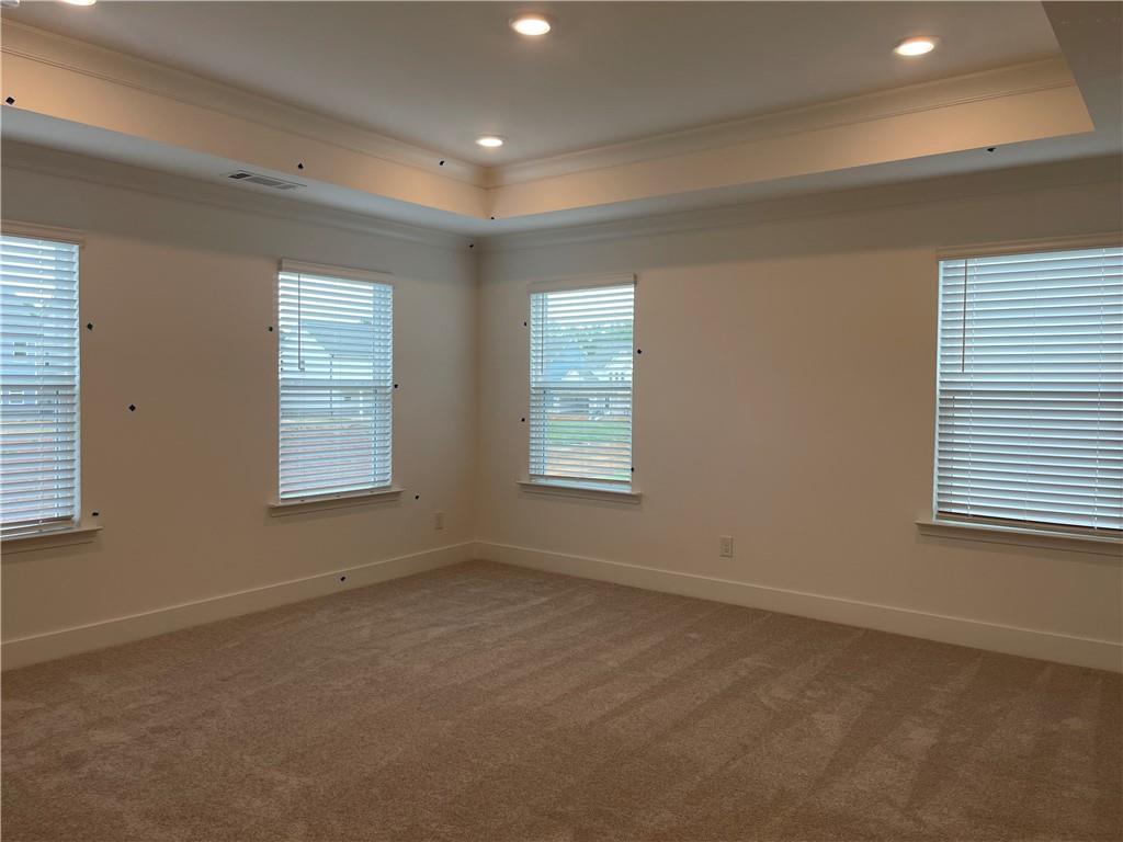 537 Hyde Rdg Trail Loganville, GA 30052 - Photo 12 of 23 a view of an empty room with a window