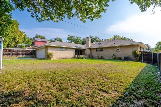 a house view with a garden space