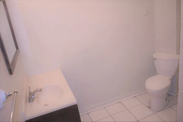 a bathroom with a toilet and a sink