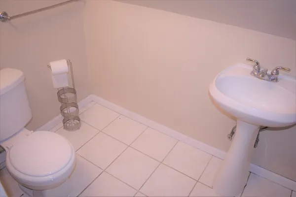 a bathroom with a sink and a toilet