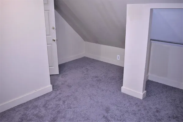 an empty room with a door