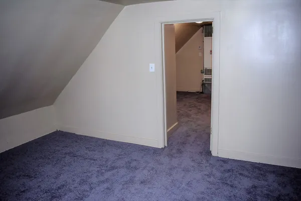 a view of a hallway with closet