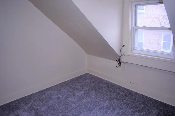 a view of a small space with a window