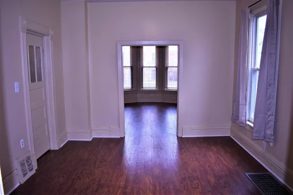 a view of livingroom with hardwood floor and window
